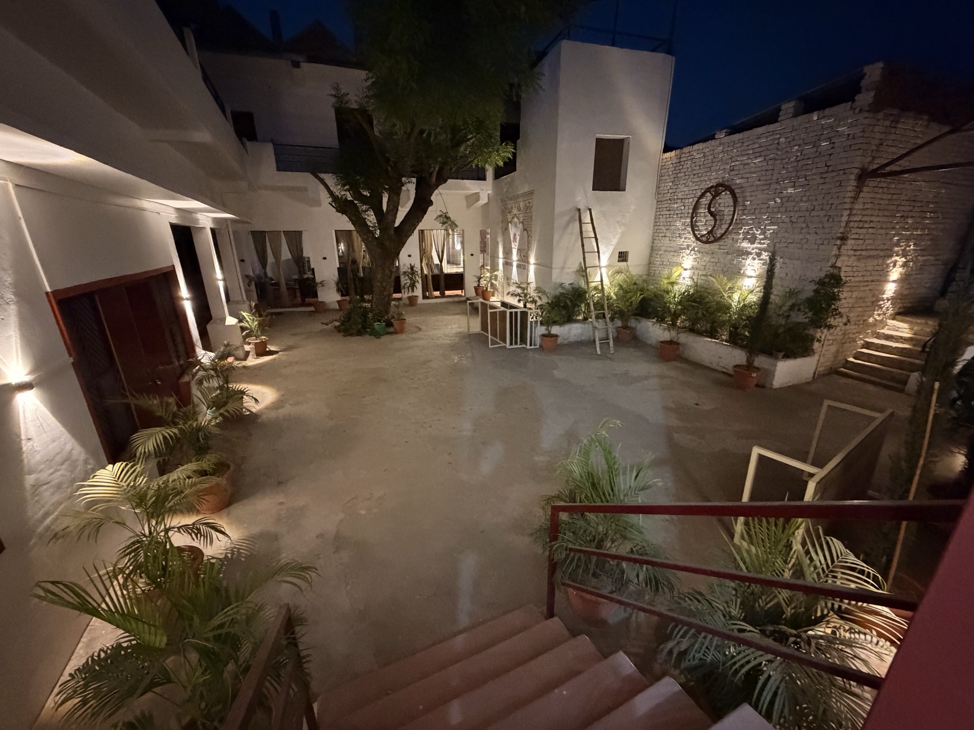 Ashram courtyard with meditation cushions
